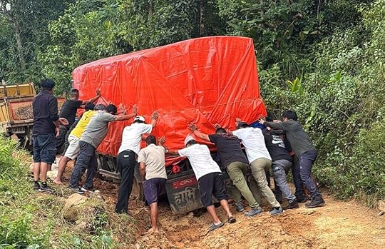 Hasten Nations reponded to Nepal Floods - Truck Stuck in Mud, Nepali Pushing