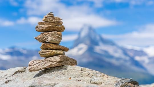 stones delicately balanced representing stability