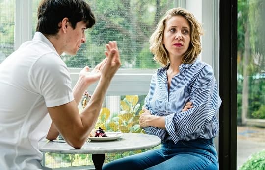 woman pausing as she prepares for a difficult conversatin