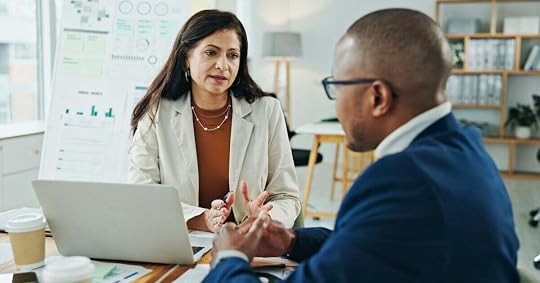 A seller presents a senior executive with a financial analysis of her solution.