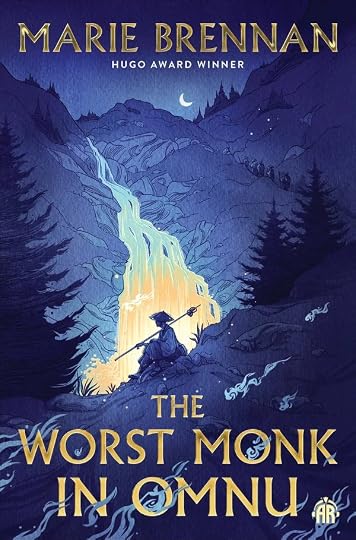 Cover art for THE WORST MONK IN OMNU by Marie Brennan. In a nighttime landscape, an Asian-looking monk is silhouetted against a glowing waterfall plunging down the mountainside.