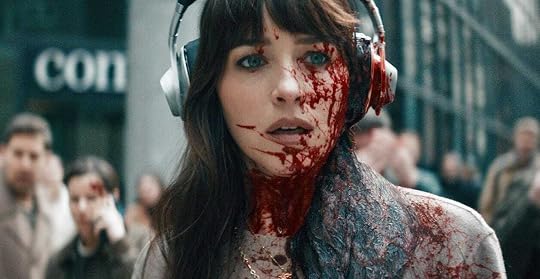 Dakota Johnson with her face covered in blood in 