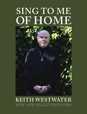 Image shows cover of Sing to me of Home: New and Selected Poems, by Keith Westwater. The book title and author name are in white text on an olive background, with the cover also showing a photo of the author, wearing black, against a background of foliage.