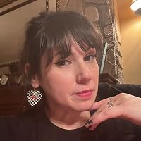 Profile Image for Jenny Mangini.