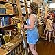 Toni with her nose stuck in a book