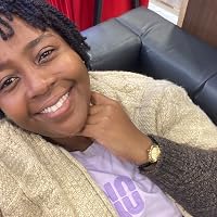 Profile Image for Amina Msangi.
