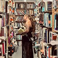 Profile Image for lights off im reading.